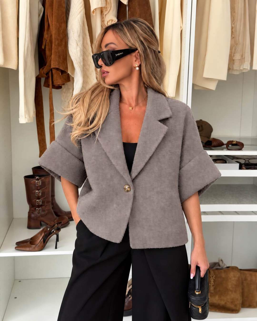 Veste courte effet laine bouclée à manches courtes et bouton