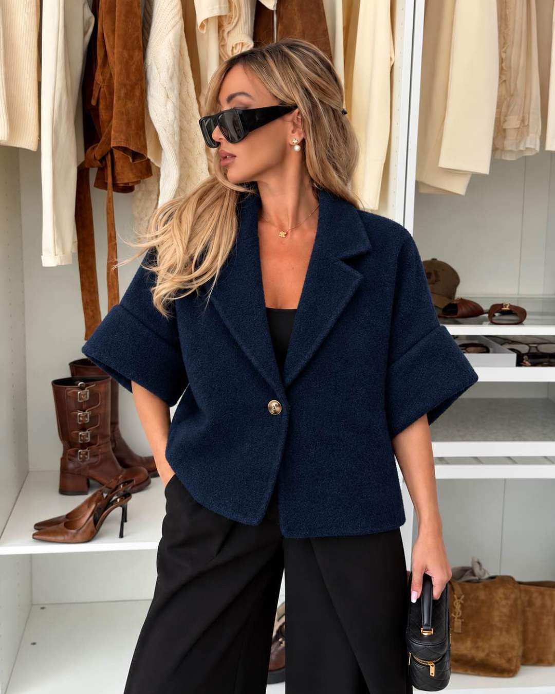 Veste courte effet laine bouclée à manches courtes et bouton