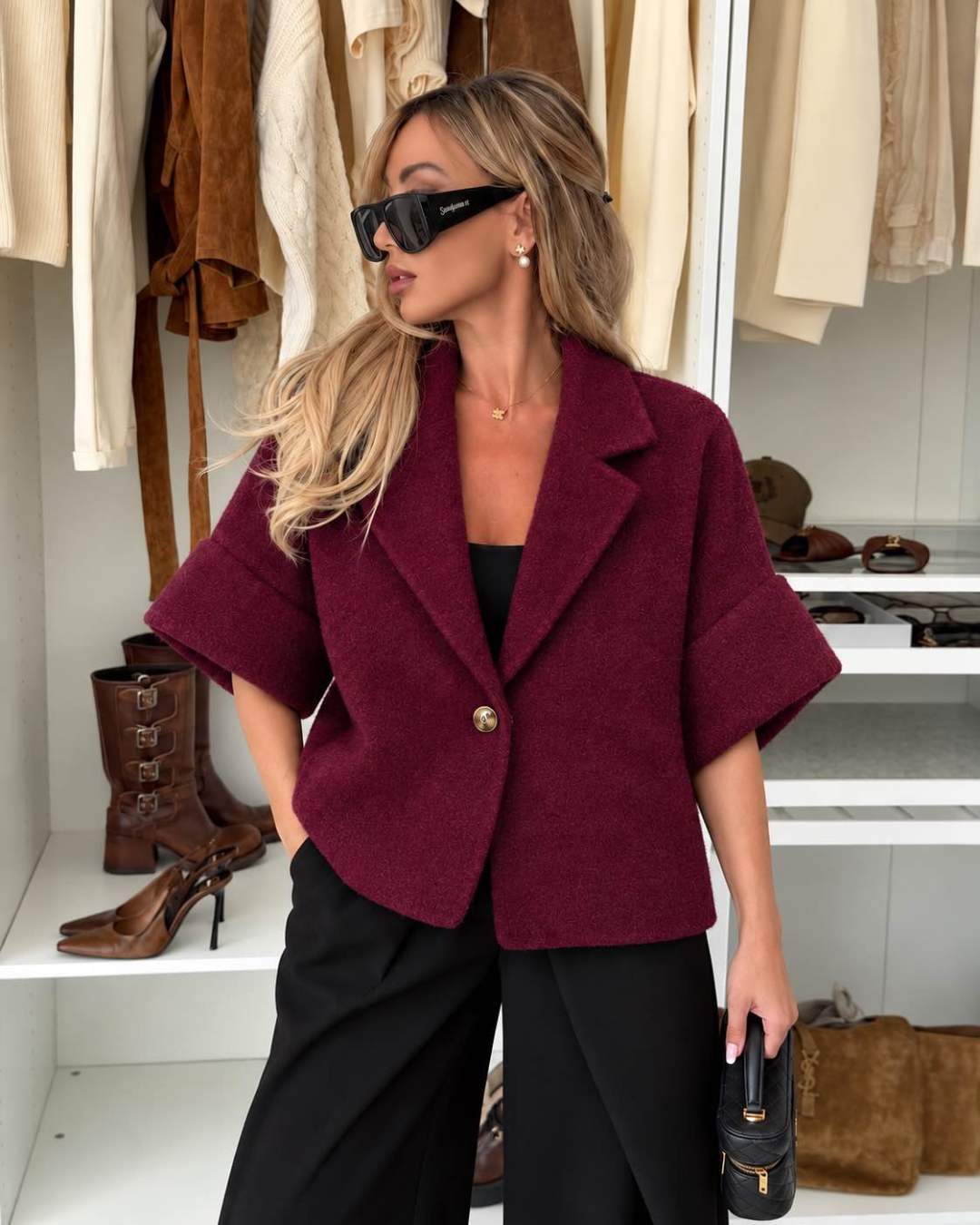 Veste courte effet laine bouclée à manches courtes et bouton