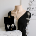 Parure boucles d oreille note de musique avec collier