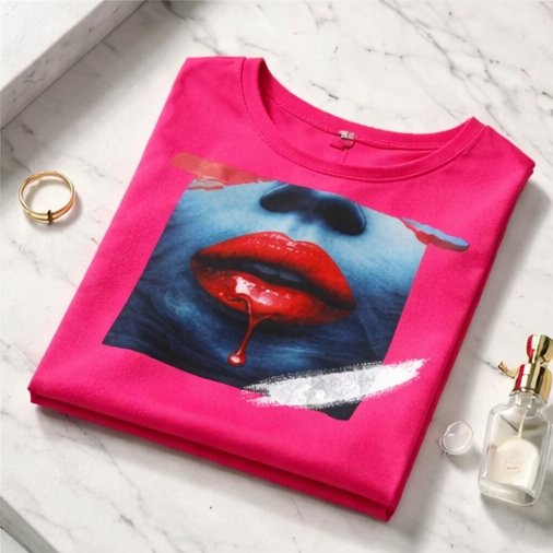 Tee shirt Taille L/XL coloris rose fushia a motifs
